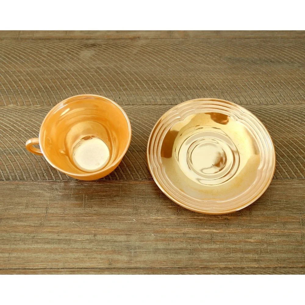 VINTAGE Fire King Peach Luster Ware Cup and Saucer